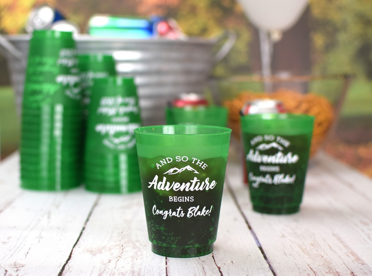 Green reusable stadium style cups with white custom script for grad parties featuring names and year graduation cups personalized