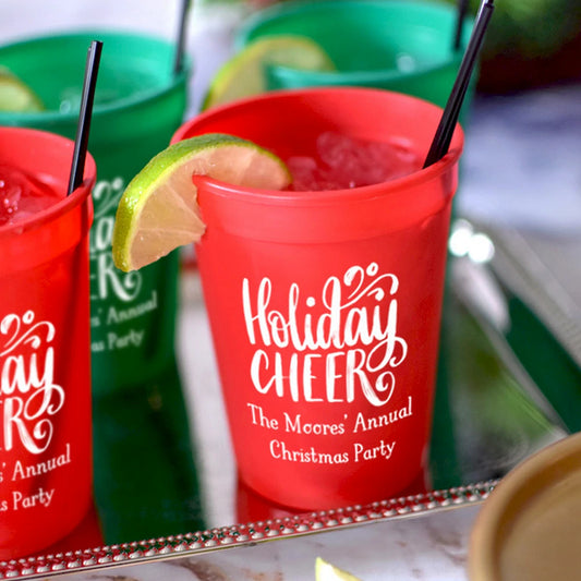 Red 12 oz personalized Christmas party stadium cups by Tippytoad with Holiday Cheer design and lime garnish
