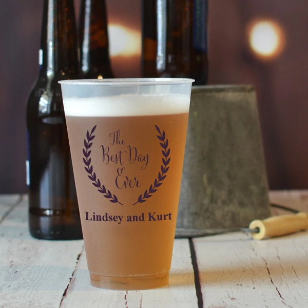 20 Oz Personalized Frosted Wedding Beer Cups with custom names Lindsey and Kurt and the text The Best Day Ever