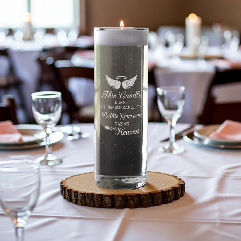 Angel Wings Personalized Memory Candle Vase with tribute text on glass placed on wooden base on table
