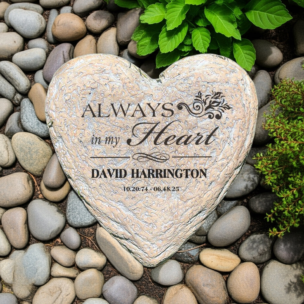 Always In My Heart personalized heart memorial garden stone surrounded by rocks and green plants