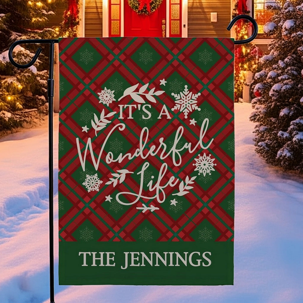 Christmas garden flag featuring a festive plaid design with the text It's a Wonderful Life