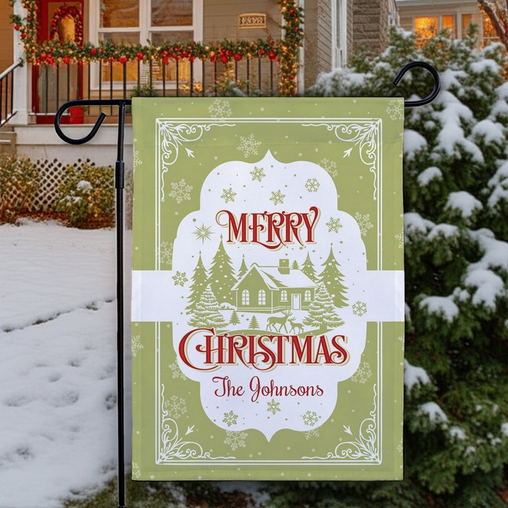 Christmas garden flag featuring a festive design with a house and snowflakes