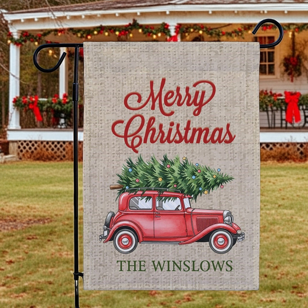 Christmas garden flag featuring a vintage red car with a Christmas tree and the text Merry Christmas