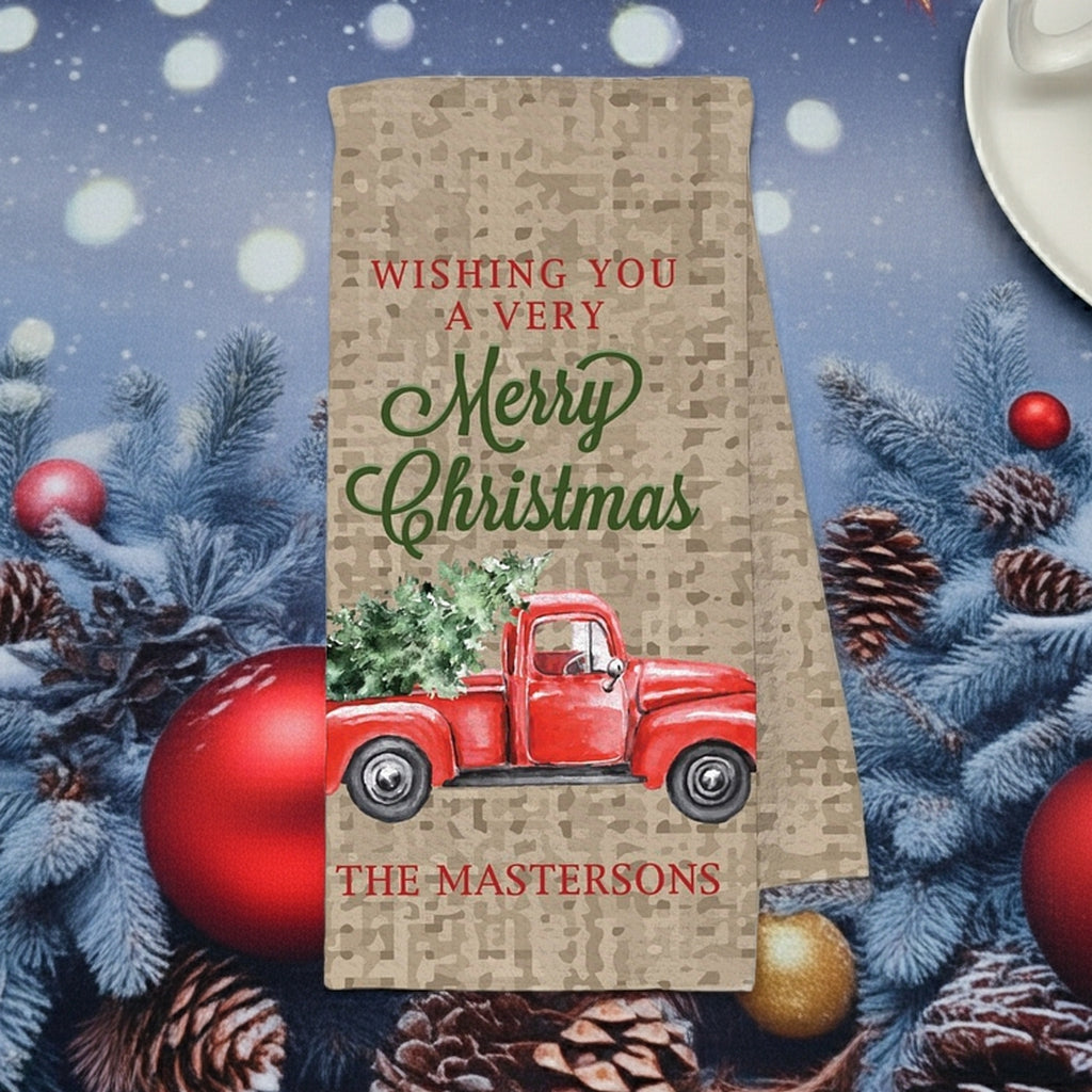 Personalized Christmas kitchen towel featuring a vintage red truck and festive greetings for holiday cheer