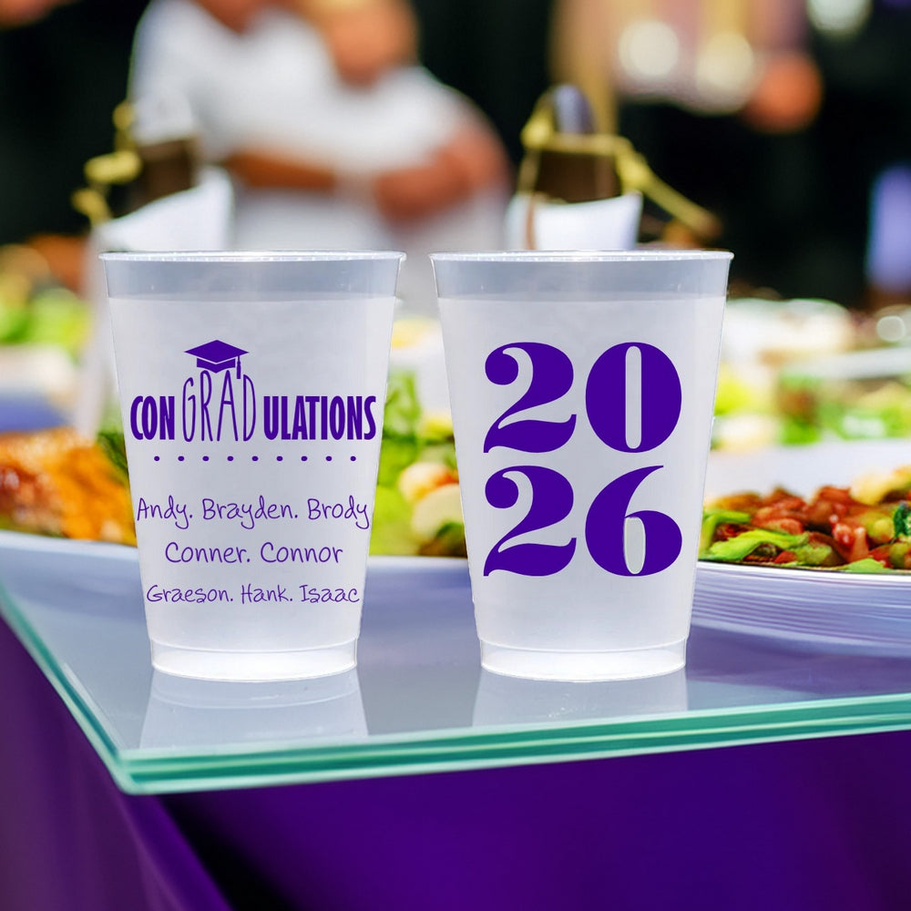 Small graduation plastic cups personalized with "conGRADulations" design, graduate names, and "2026" design in purple print