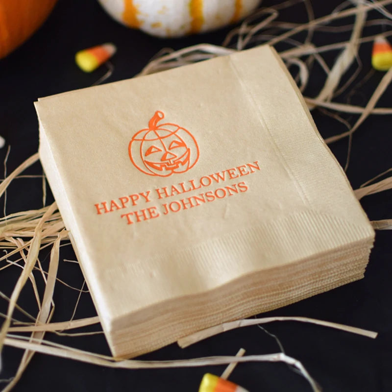 Tippytoad personalized Halloween cocktail napkins beige with orange jack o lantern and custom family name