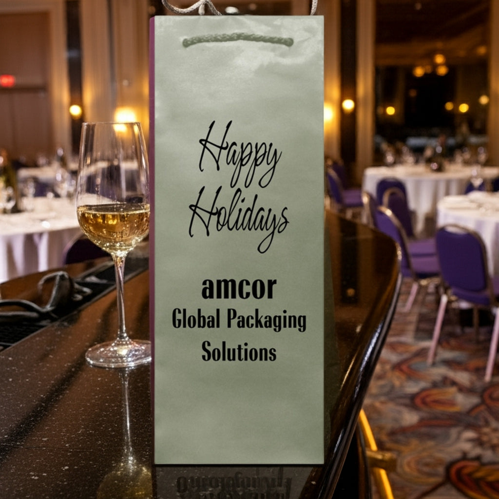 Custom Printed Christmas Wine Bottle Gift Bags showing green Happy Holidays wine bag with amcor logo on bar