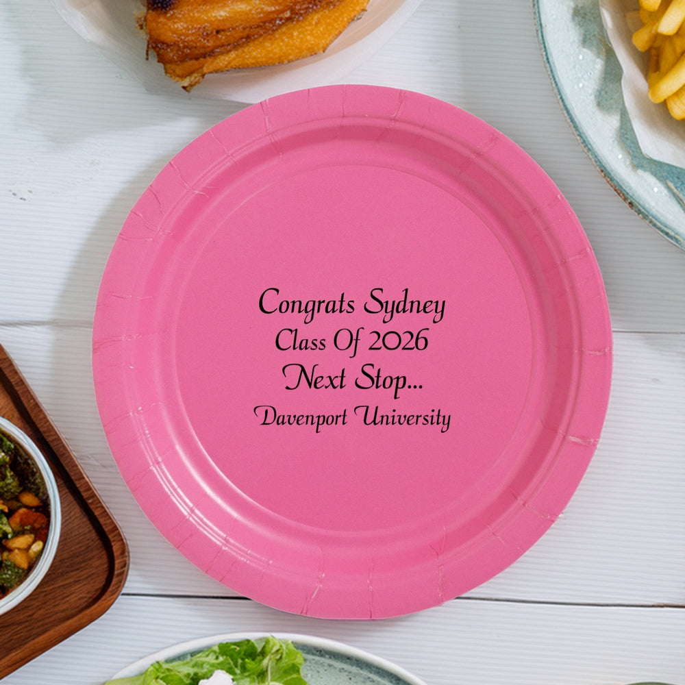 Bright pink paper graduation dinner plate personalized with four lines of custom text in black print