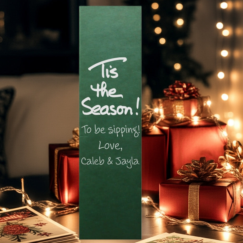 Green wine bottle bag with white script message and wrapped gifts foil stamped personalized Christmas wine bottle gift boxes