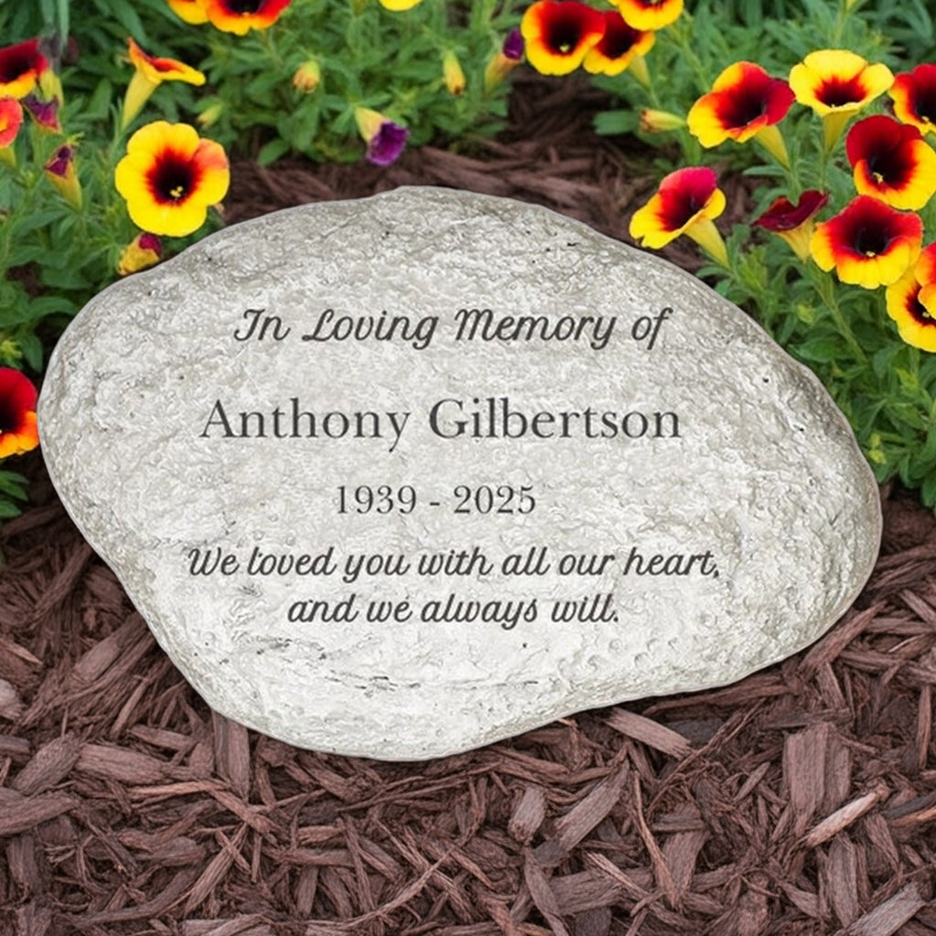 In loving memory personalized memorial garden stone with engraved name and dates surrounded by colorful flowers