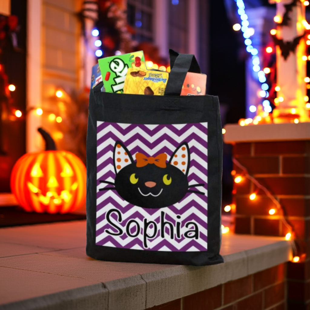 girl black cat personalized trick or treat bag with purple chevron panel named Sophia filled with candy on Halloween porch