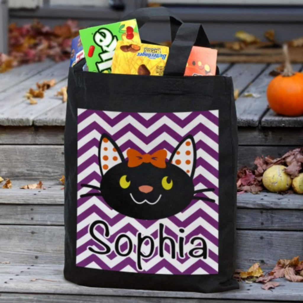 Girl black cat personalized trick or treat bag with orange bow cat face and Sophia name on purple chevron panel