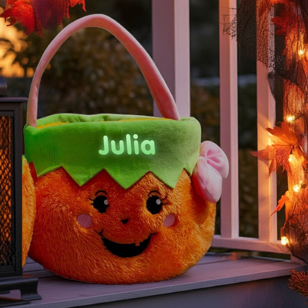 Glow in the dark personalized trick or treat basket with pumpkin face and name Julia