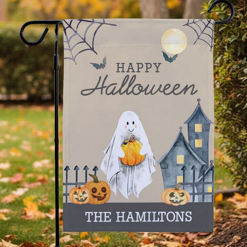 Halloween garden flag with smiling ghost holding pumpkin haunted house pumpkins personalized family name