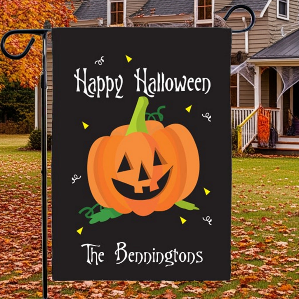 Black Halloween garden flag personalized with smiling jack o lantern Happy Halloween and The Benningtons