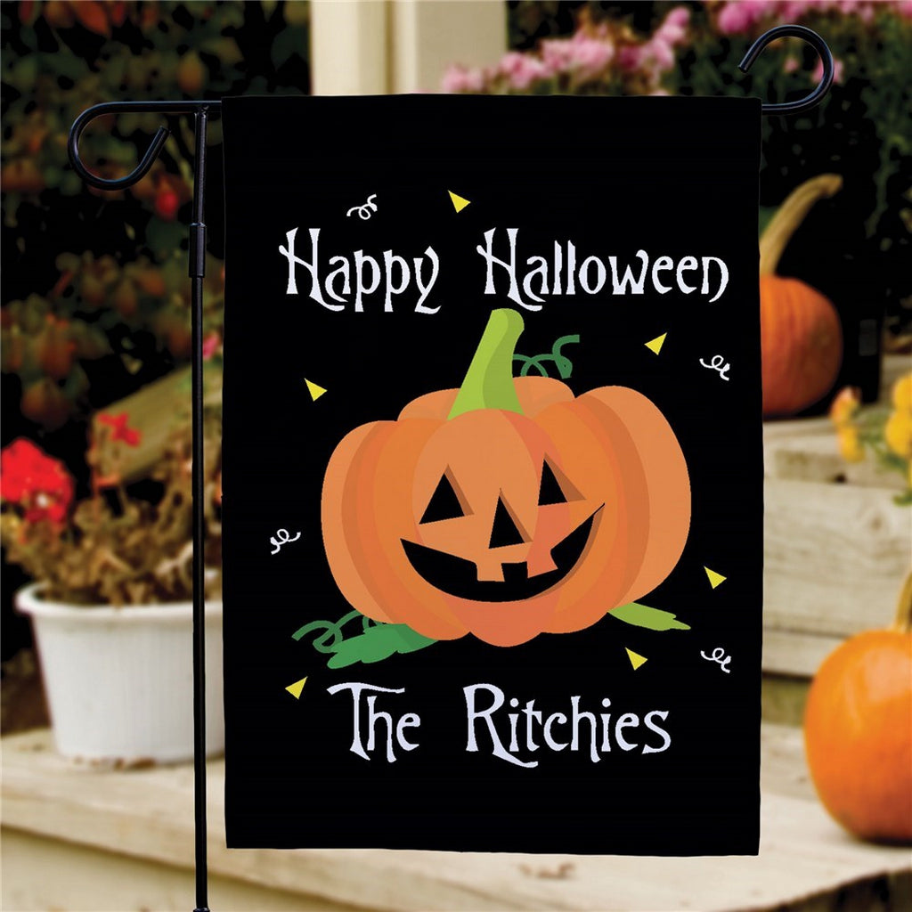 Halloween garden flag personalized with smiling jack o lantern Happy Halloween text and The Ritchies name