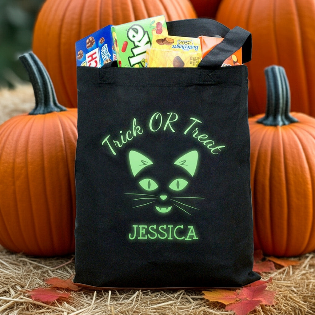Glow in the dark cat personalized trick or treat bag black tote with green cat face Jessica name and candy