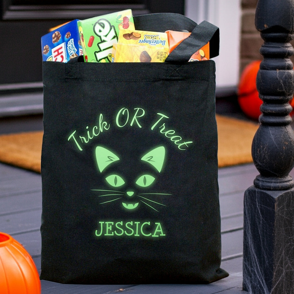 glow in the dark cat personalized trick or treat bag black tote with neon cat face and name Jessica