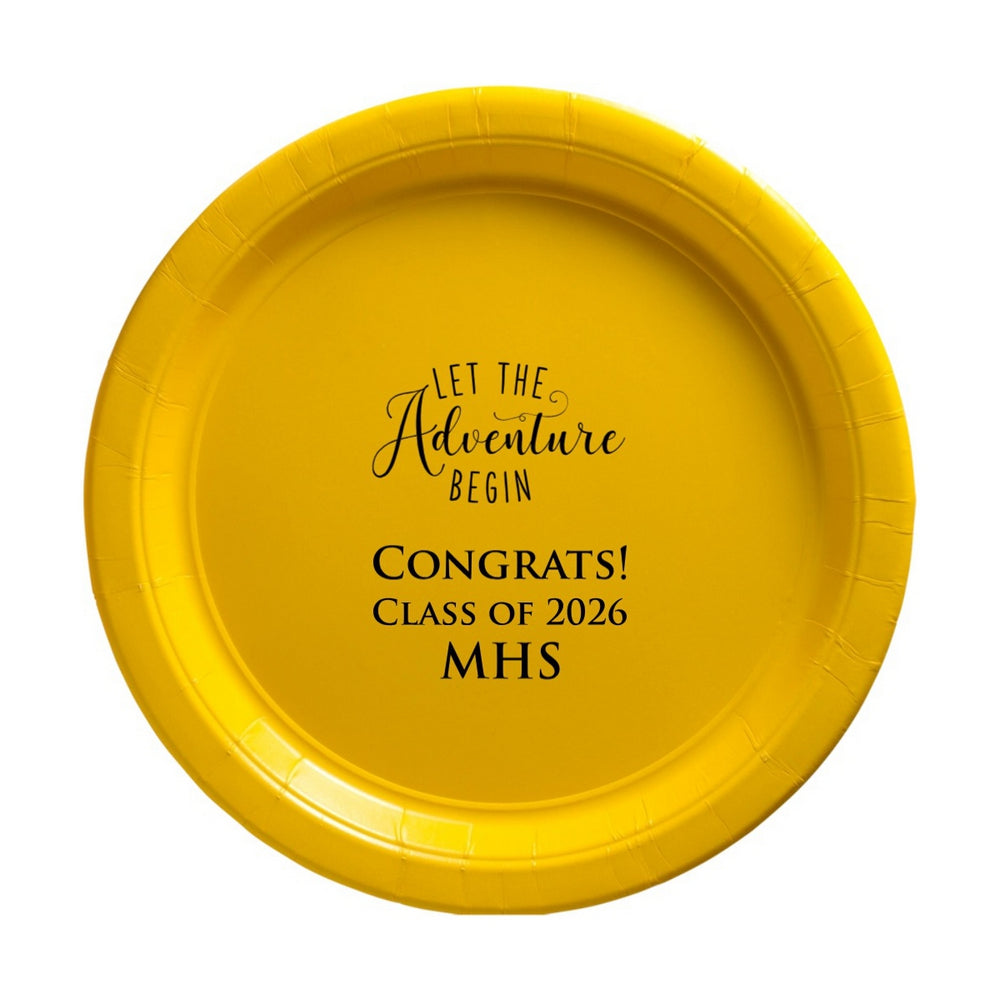 A Yellow paper grad party plate personalized with "Let the Adventure Begin" design and text "Congrats! Class of 2026, MHS" in black print