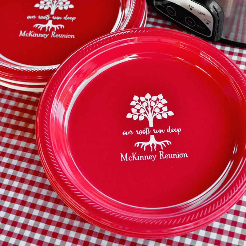 Personalized 10 in plastic family reunion dinner plates in red with family tree design and McKinney Reunion text