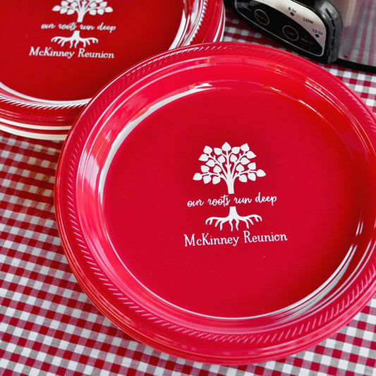 Personalized 10 in plastic family reunion dinner plates in red with family tree design and McKinney Reunion text
