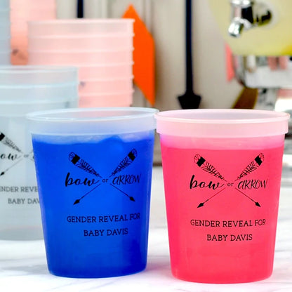 16 oz size blue and pink color changing stadium cups personalized for baby shower with bow or arrow design and 3 lines of custom text in black print