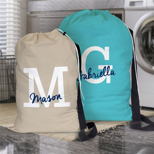Laundry bag gifts personalized with bock initials and script names in Turquoise and Cashmere color bag color options.