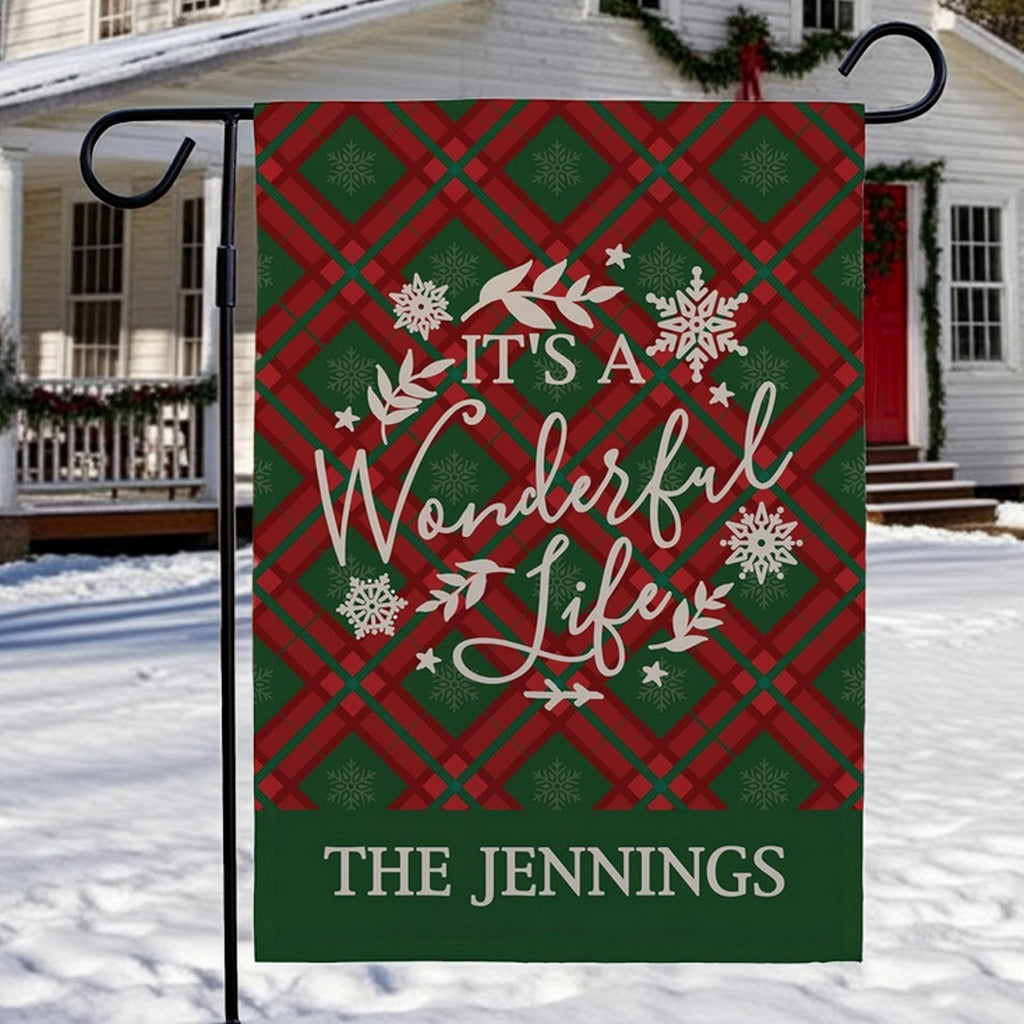Christmas garden flag featuring a festive plaid design with the text It's A Wonderful Life