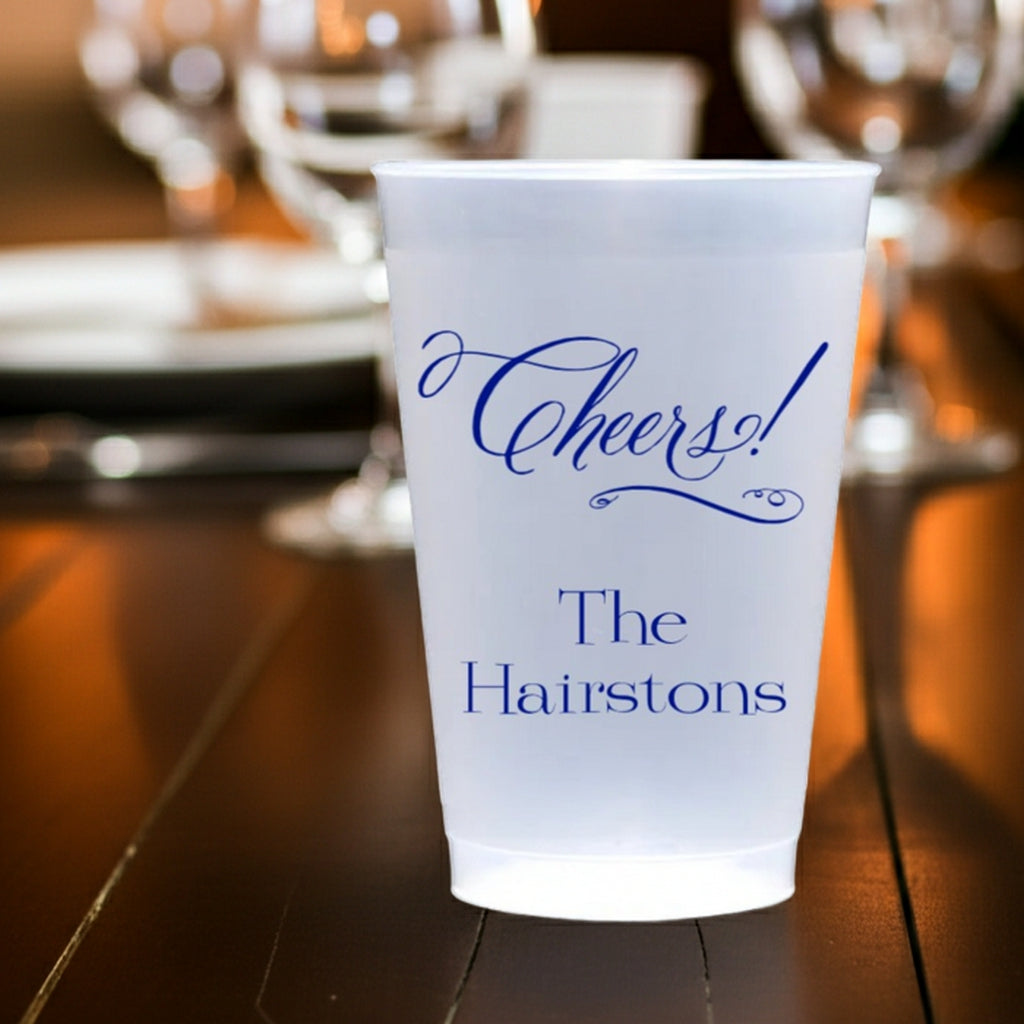 Personalized frosted plastic Christmas cups featuring festive Cheers design for holiday parties