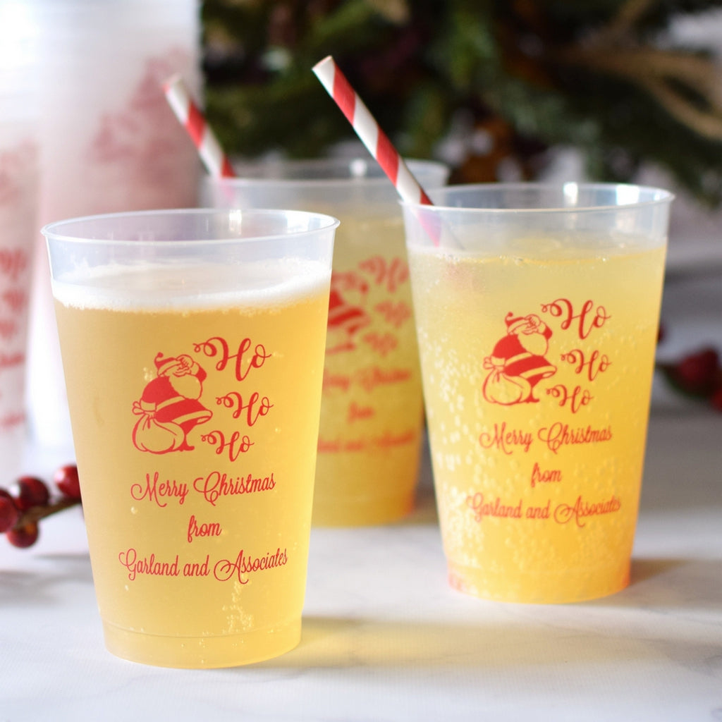 Personalized frosted plastic Christmas cups with festive designs for holiday gatherings