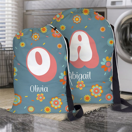 Regular and large size groovy flowers print laundry bags personalized with Initials and names for graduation and going to college gifts.