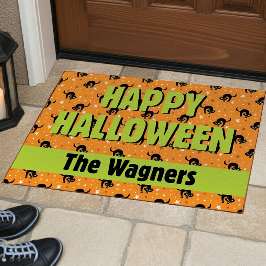 Personalized happy halloween doormat with black cats and stars in green and orange colors
