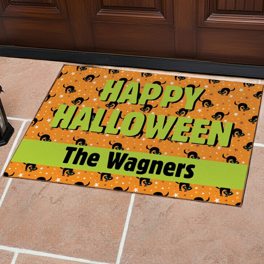 Personalized happy halloween doormat with green text and black cat pattern on orange background