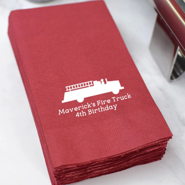 Red color disposable paper guest towel napkins personalize for kids birthday party with firetruck and 2 lines of text in white print