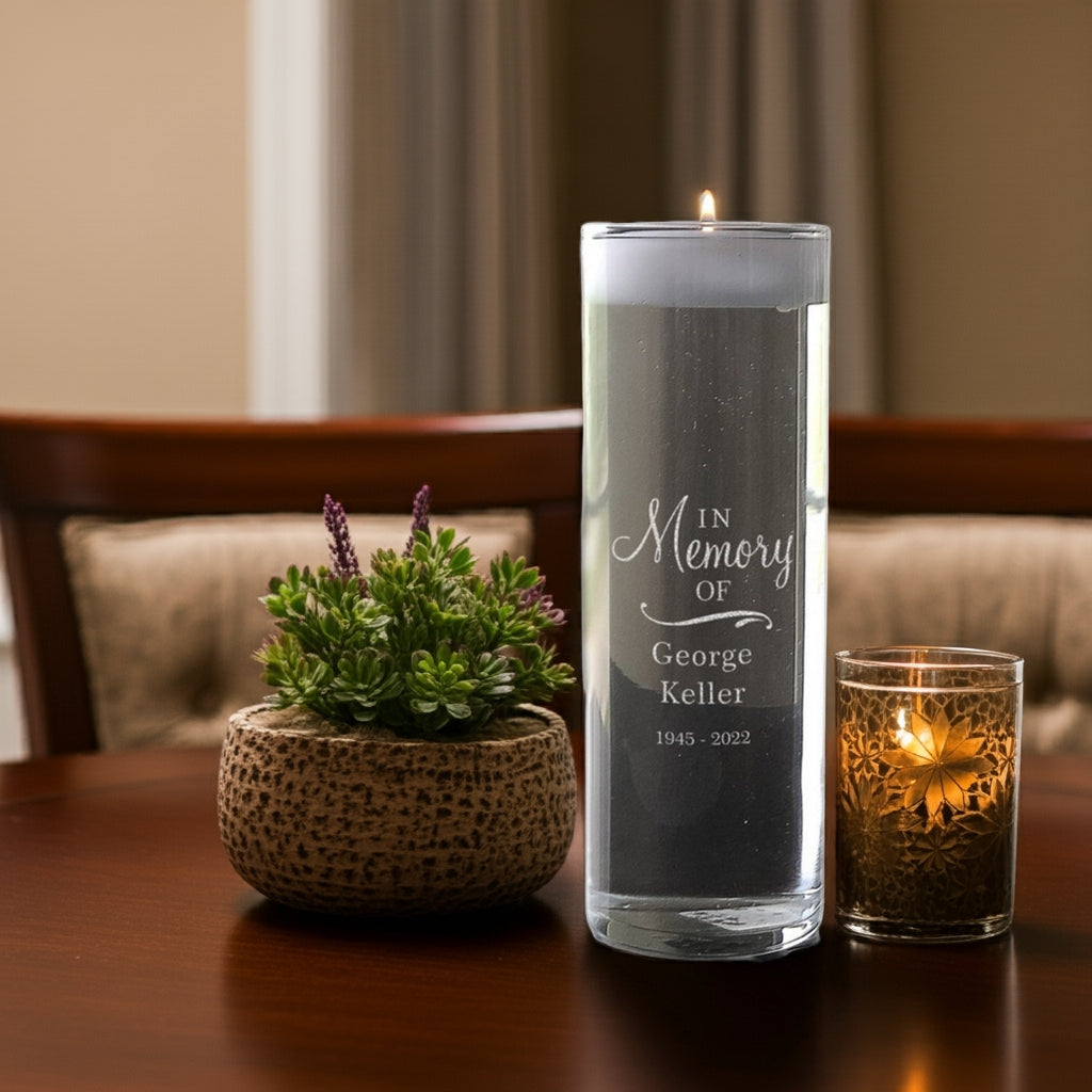 Personalized memorial candle vase with in memory engraving for George Keller on wooden table