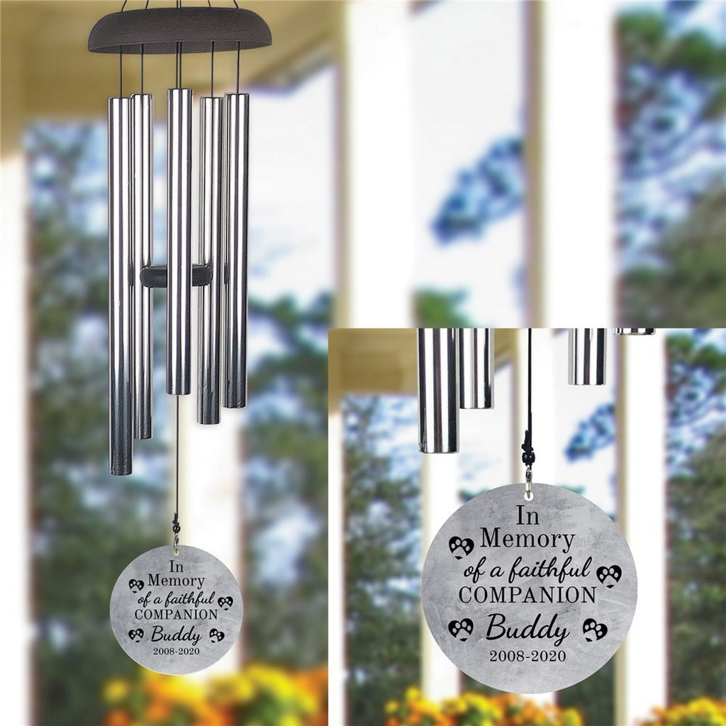 Personalized pet memorial wind chime with a round engraved pendant reading In Memory of a faithful Companion Buddy 2008-2020