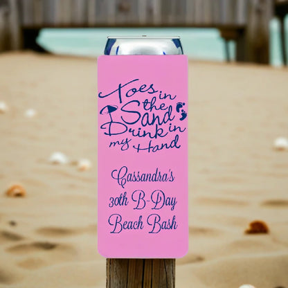 Neon pink color skinny can cooler personalized for adult birthday with toes in the sand design and 3 lines of text in navy print on fence post at a beach