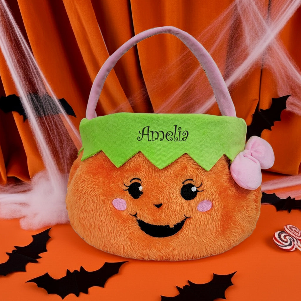 Personalized trick or treat basket plush pumpkin design with green top and pink bow