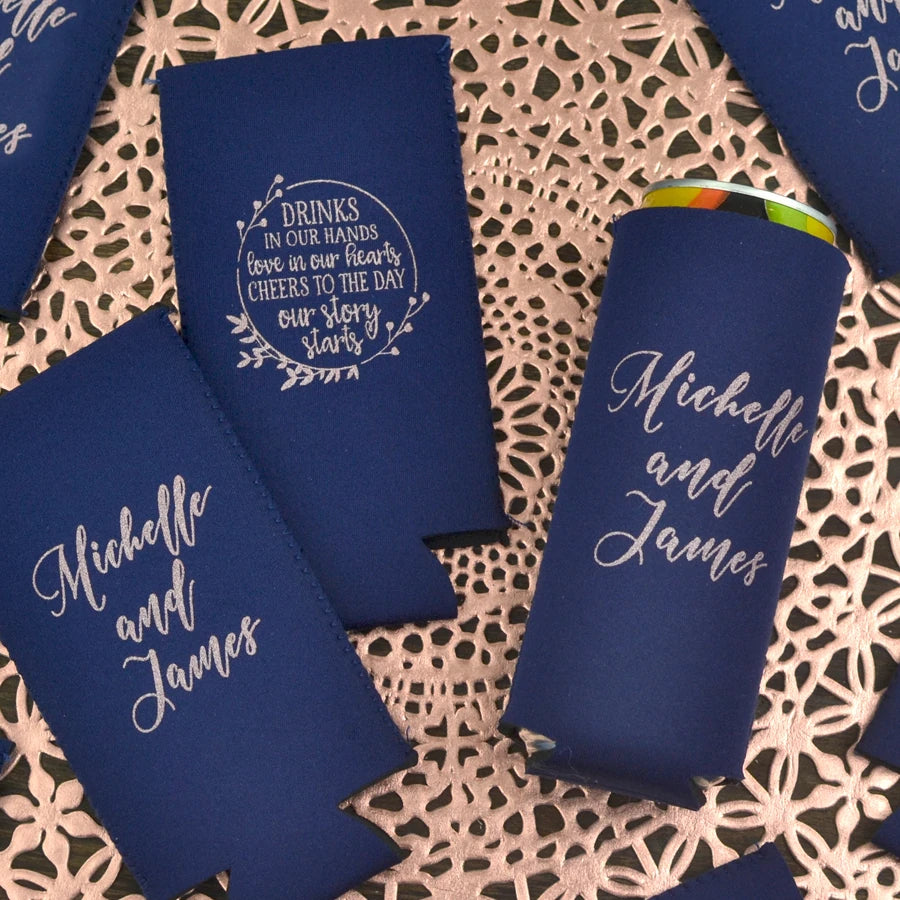 Navy color slim wedding can coolers personalized with drinks in our hands design on back side and bride and groom name on back side in silver print