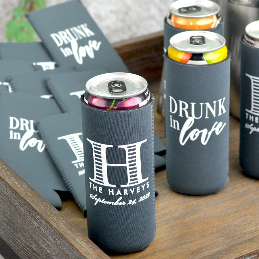 Charcoal color waterproof slim wedding can cooler favors custom prinjted with drunk in love design on back and initial and married couple name and wedding date on the front in white print