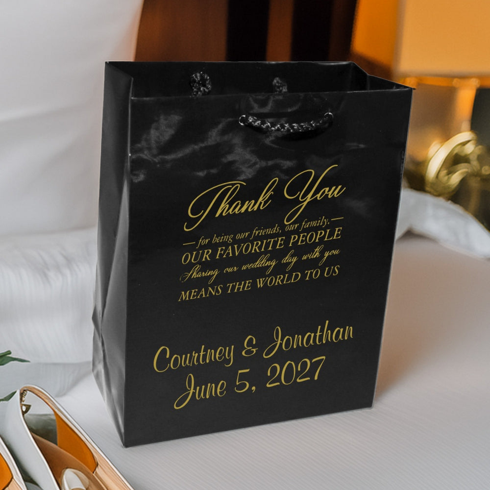 Tippytoad black glossy wedding gift bag with gold script names and date personalized wedding welcome bags custom printed