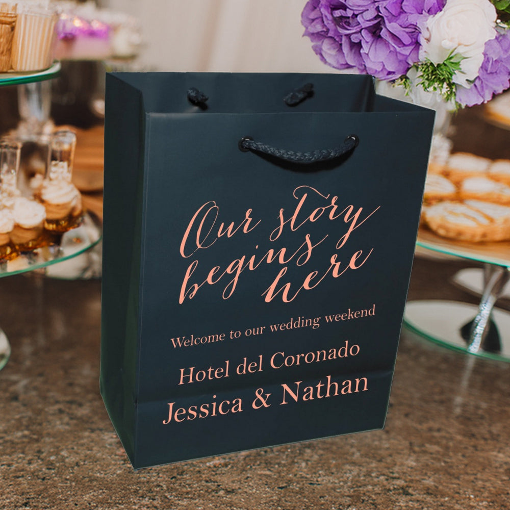 Dark navy personalized wedding gift bag with rose gold script and rope handles wedding welcome bags custom printed by Tippytoad