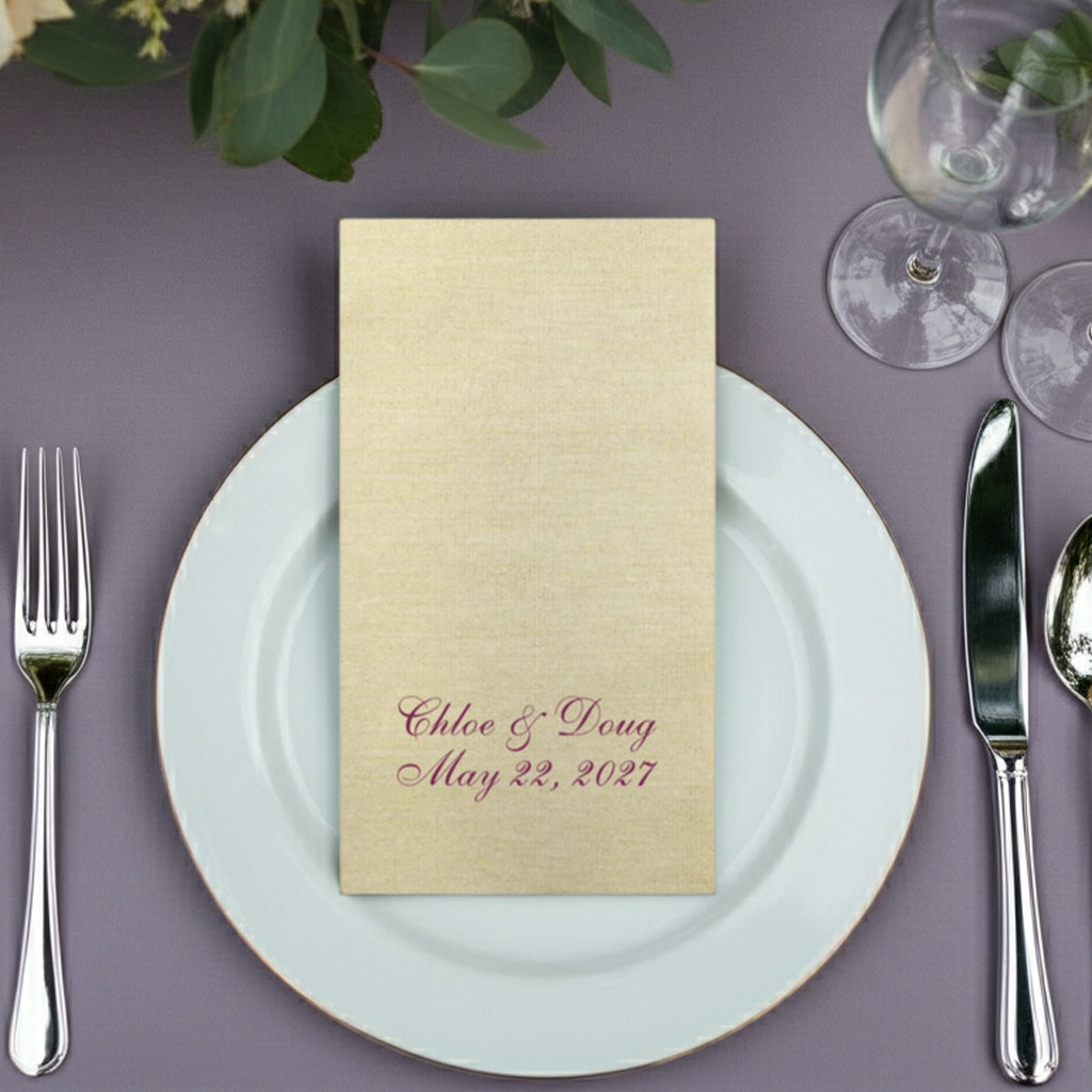 Elegant wedding table setting featuring premium linen feel guest towel napkins with personalized names and date
