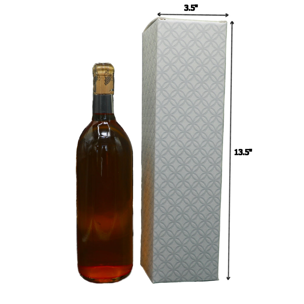 Wine bottle next to silver quilted gift box displaying dimensions 13.375 in H x 3.5 in W