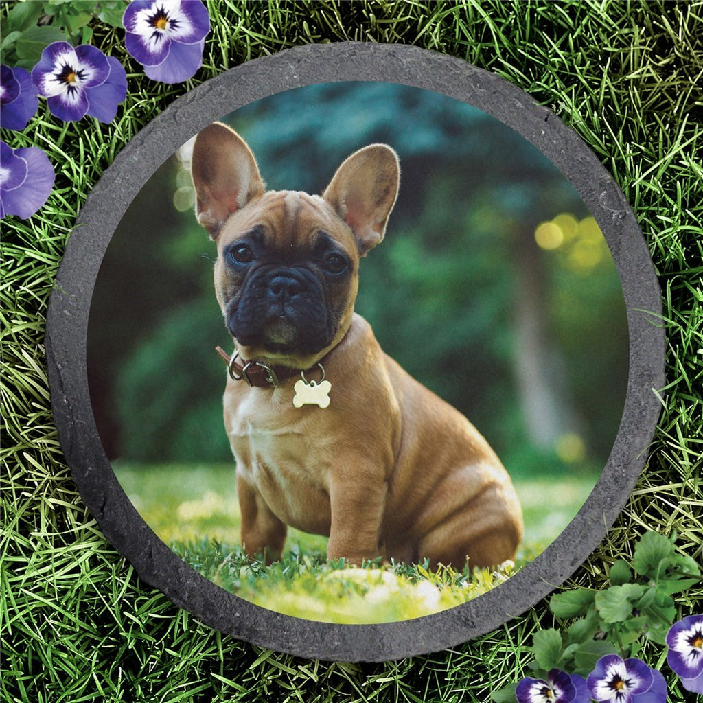 Round slate custom photo garden stone with a dog image surrounded by grass and purple flowers