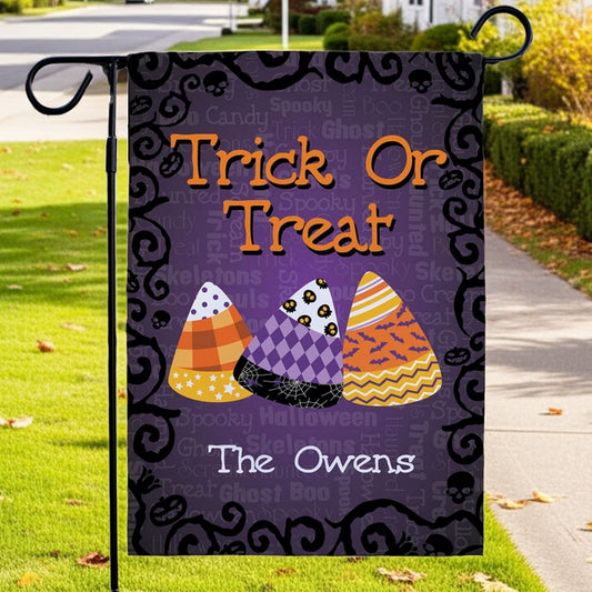 Halloween garden flag personalized Trick Or Treat design with candy corn trio purple background and Owens name