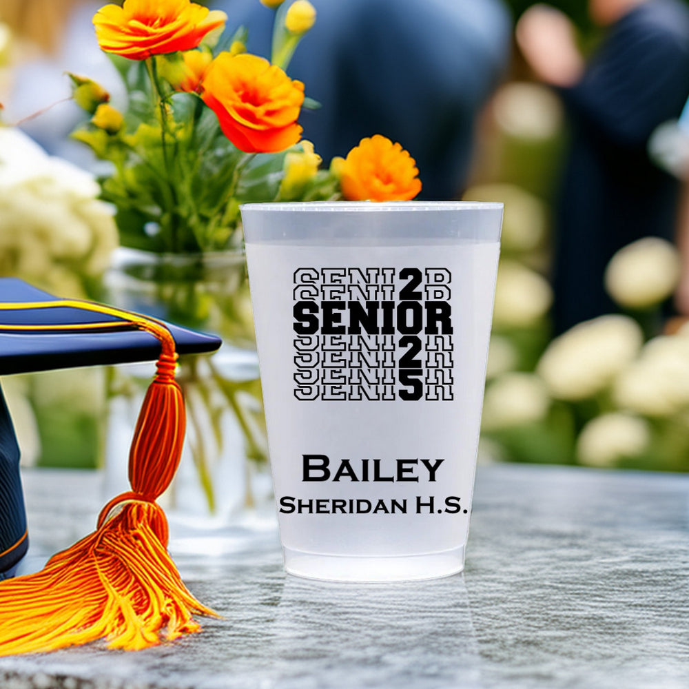 Small graduation cup personalized with "SENIOR 2025" design, graduate name and high school name in black print
