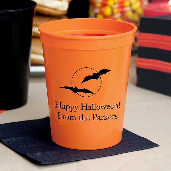 Orange Tippytoad personalized halloween stadium cups with black bat silhouette and Happy Halloween From the Parkers text