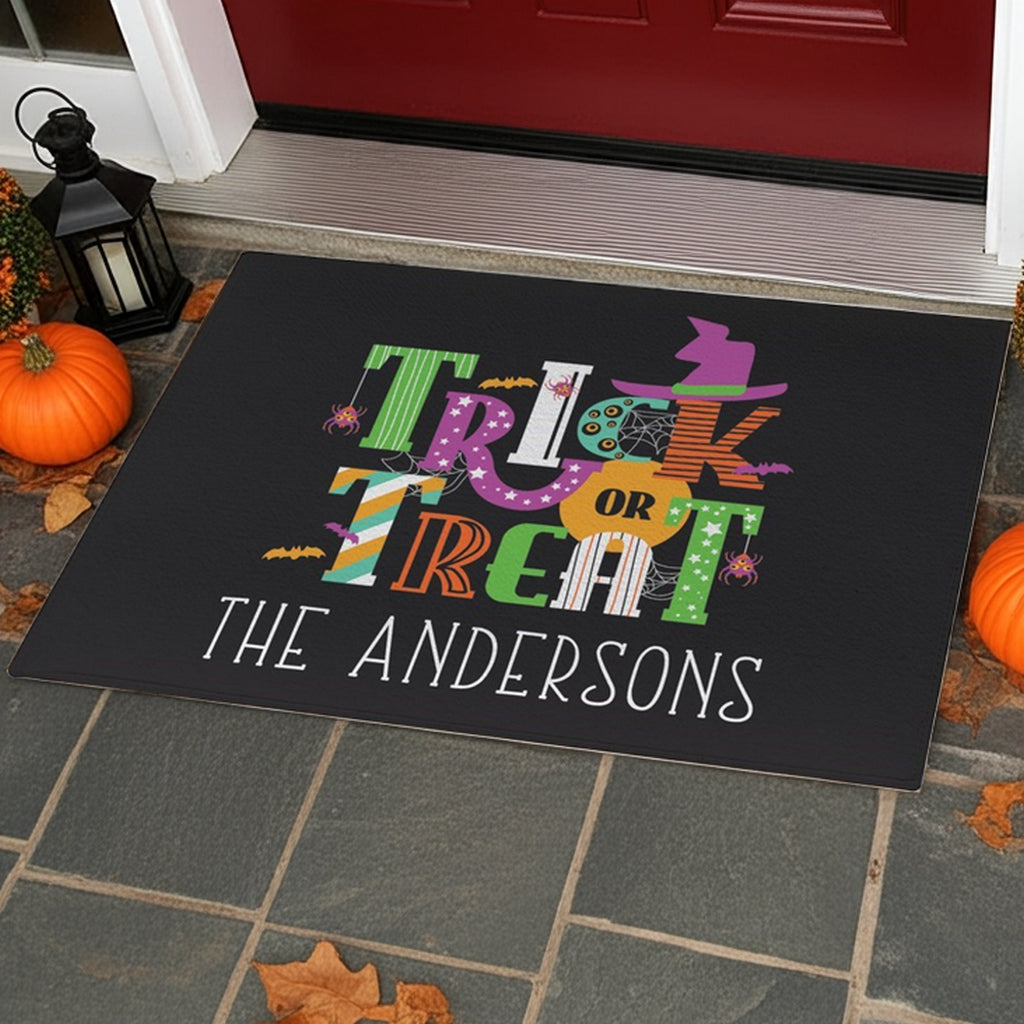 Trick or treat personalized doormat with colorful Halloween design and custom family name Andersons